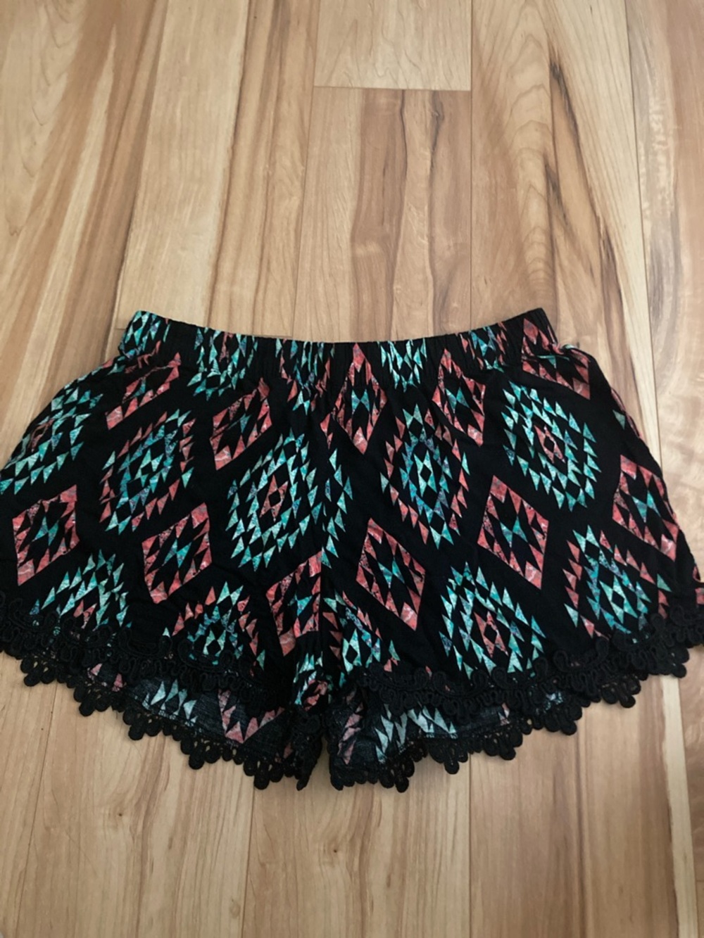 just be Black Shorts with Teal and Coral Aztec Print